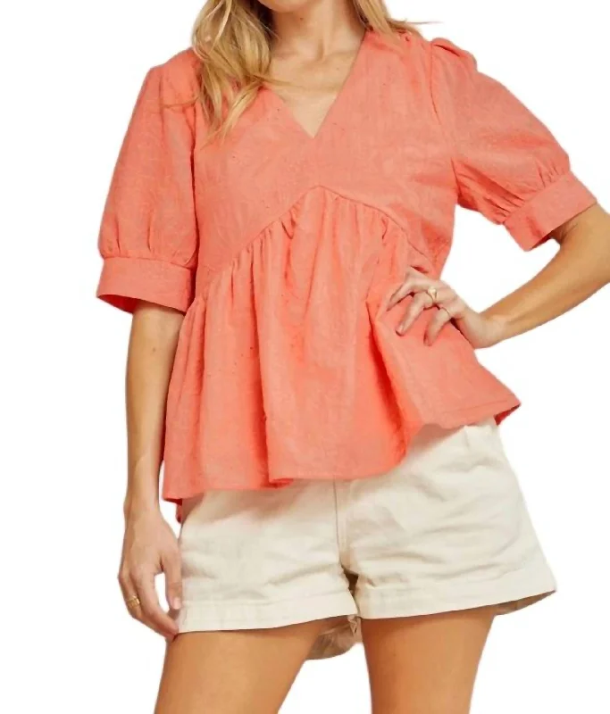 Relaxed Style Flared Hem Eyelet Top In Coral